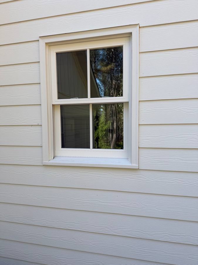 After window cleaning — clean window and bright siding